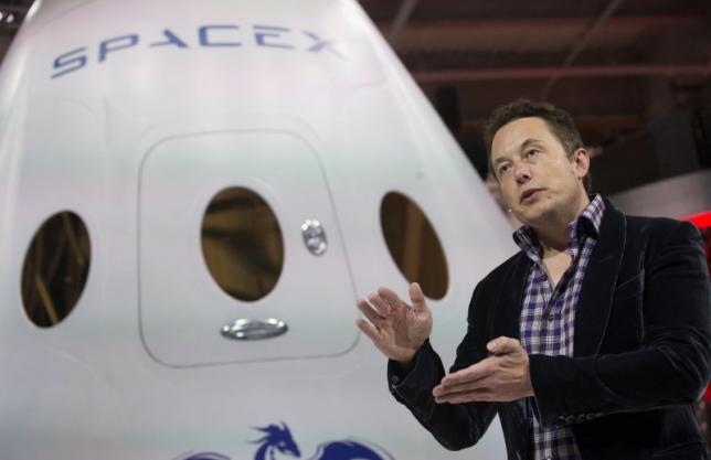 SpaceX CEO Elon Musk speaks after unveiling the Dragon V2 spacecraft in Hawthorne, California May 29, 2014.