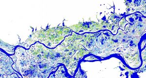 A map showing the distribution and change in surface water over a 32-year period. This particular map shows the River Ob in Siberia, where dark blue colors are areas of permanent water, lighter blue colors are areas of seasonal water, green colors represent new areas of seasonal water, and pink colors represent areas of lost seasonal water. (Image: © EC-Joint Research Centre / Google, 2016)